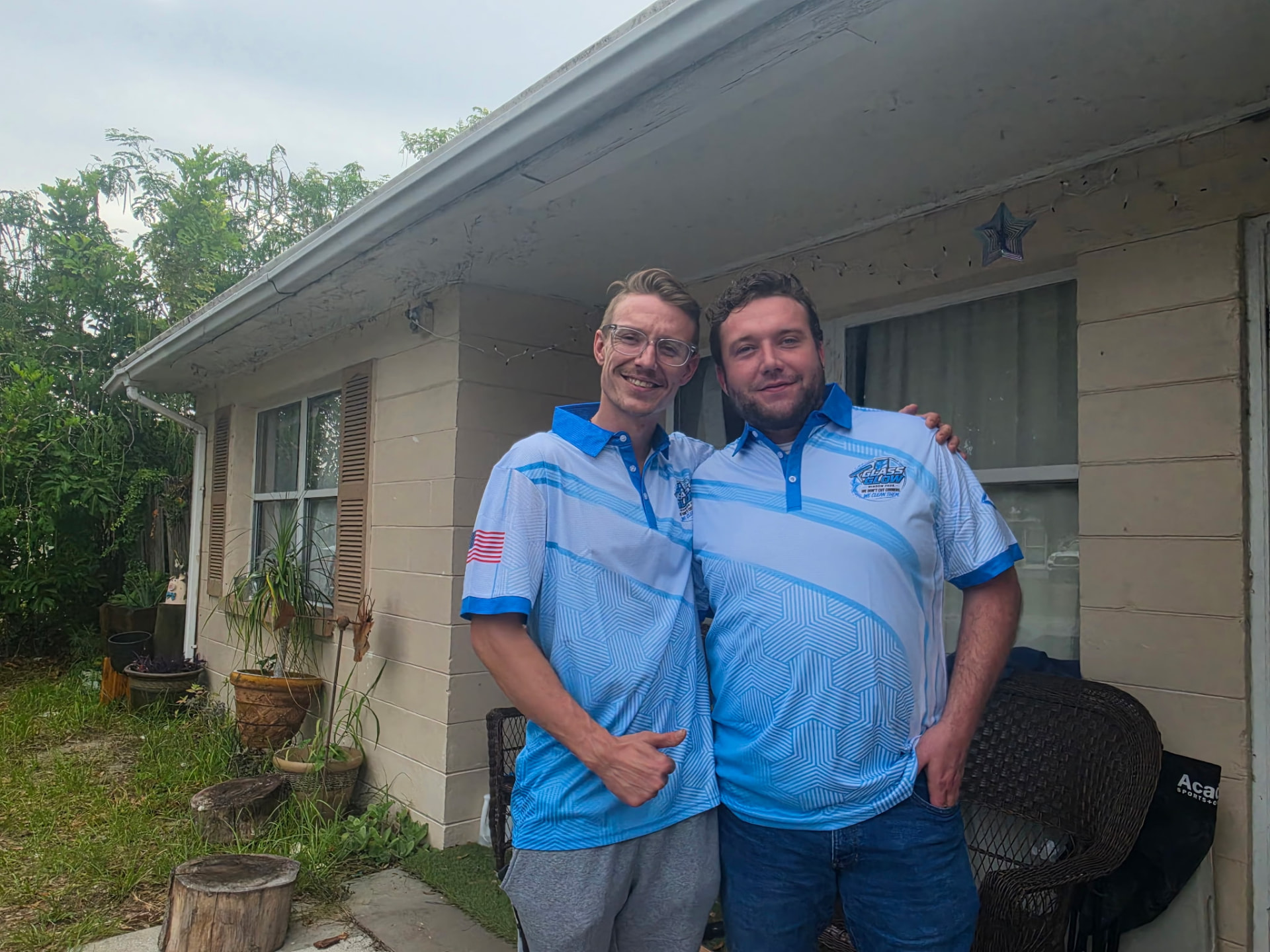 The Glass Glow Window Pros team in their branded polos
